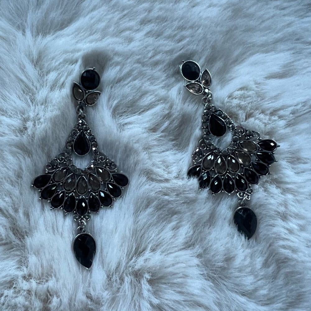 Iris shaped chandelier earrings classy and fun . Lightweight posts and sparkle.